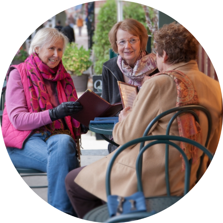 Three old ladies sitting around the table